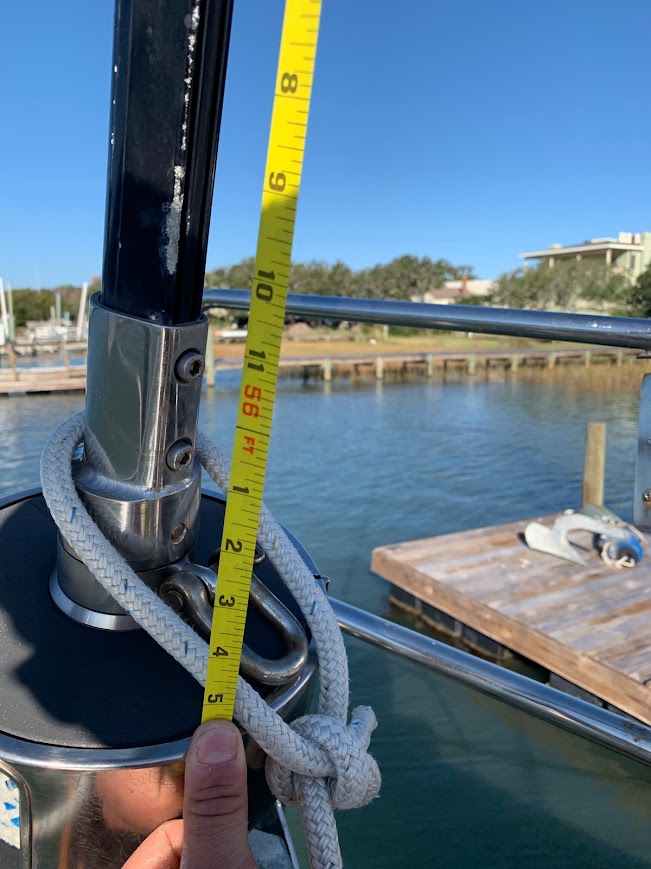 Measuring an existing fitting aboard a boat before planning the work